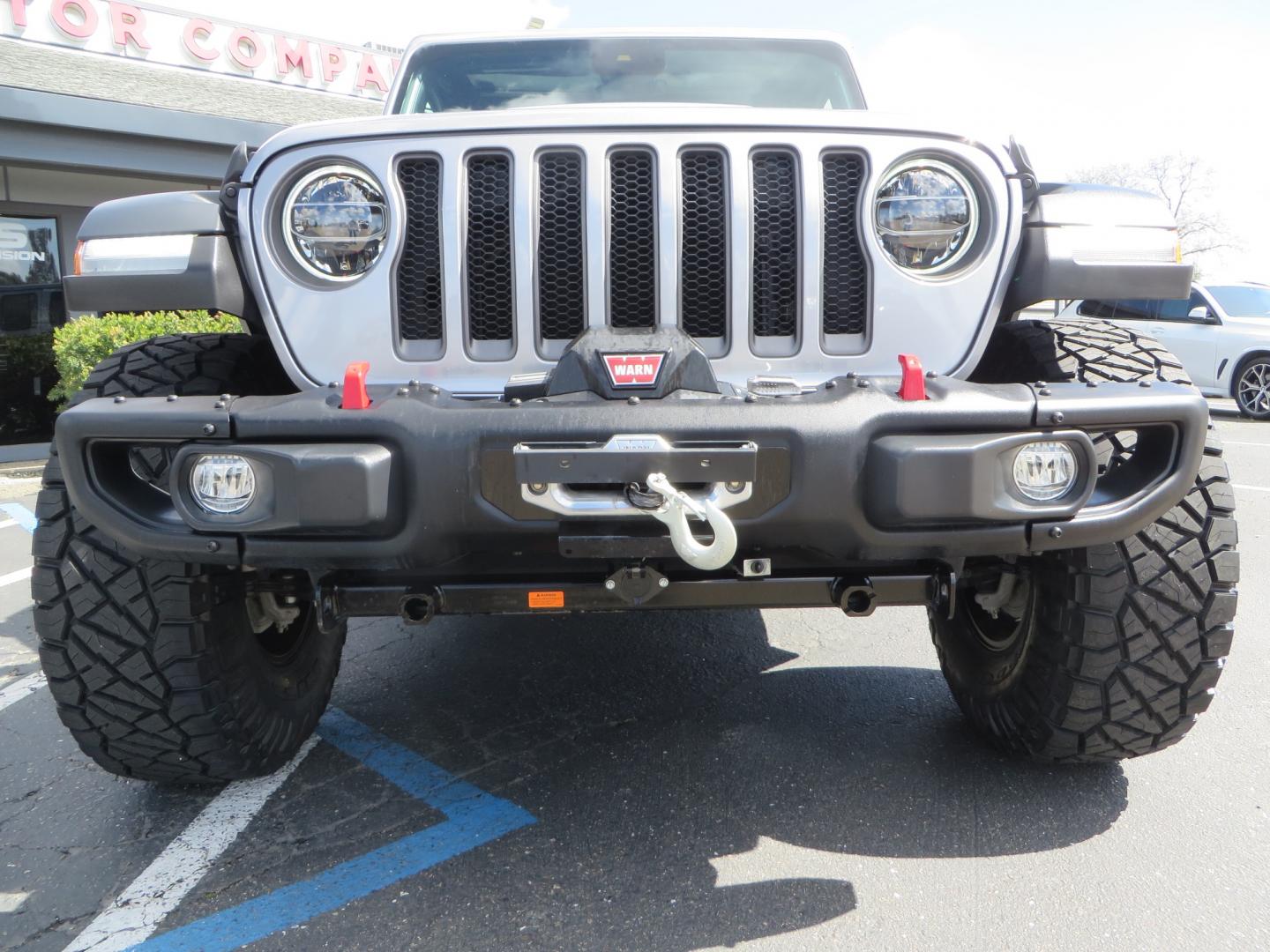 2021 SILVER /BLACK Jeep Wrangler Unlimited Rubicon (1C4HJXFG7MW) with an 3.6L V6 DOHC 24V FFV engine, 6A transmission, located at 2630 Grass Valley Highway, Auburn, CA, 95603, (530) 508-5100, 38.937893, -121.095482 - Features - Zone Offroad 3" Lift kit, Fox shocks, 37" Nitto Ridge Grappler tires, 17" Fuel Piston wheels, Warn winch, KC led lights, Voswitch switches, Teraflex HD tire relocation, Fire extinguisher, High Lift Jack, Shovel, Axe, Jumper Cables, and flat towable. - Photo#10